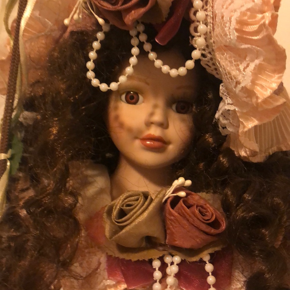 Goldenvale 2000 doll on a swing